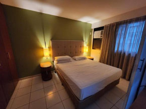 Quarto, sala e varanda em Copa